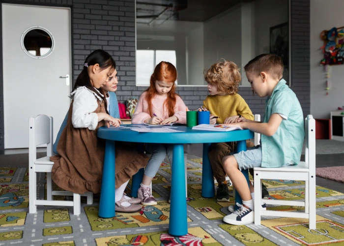 Group of children socializing and sharing at montessori schools near me