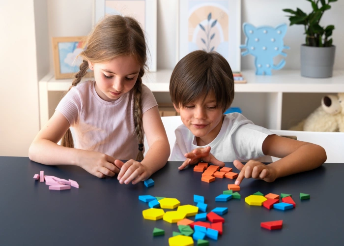 Happy preschoolers participating in sensory learning at montessori schools near me